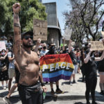 Newport Beach protesters scatter as car heads toward them; suspect in custody: report